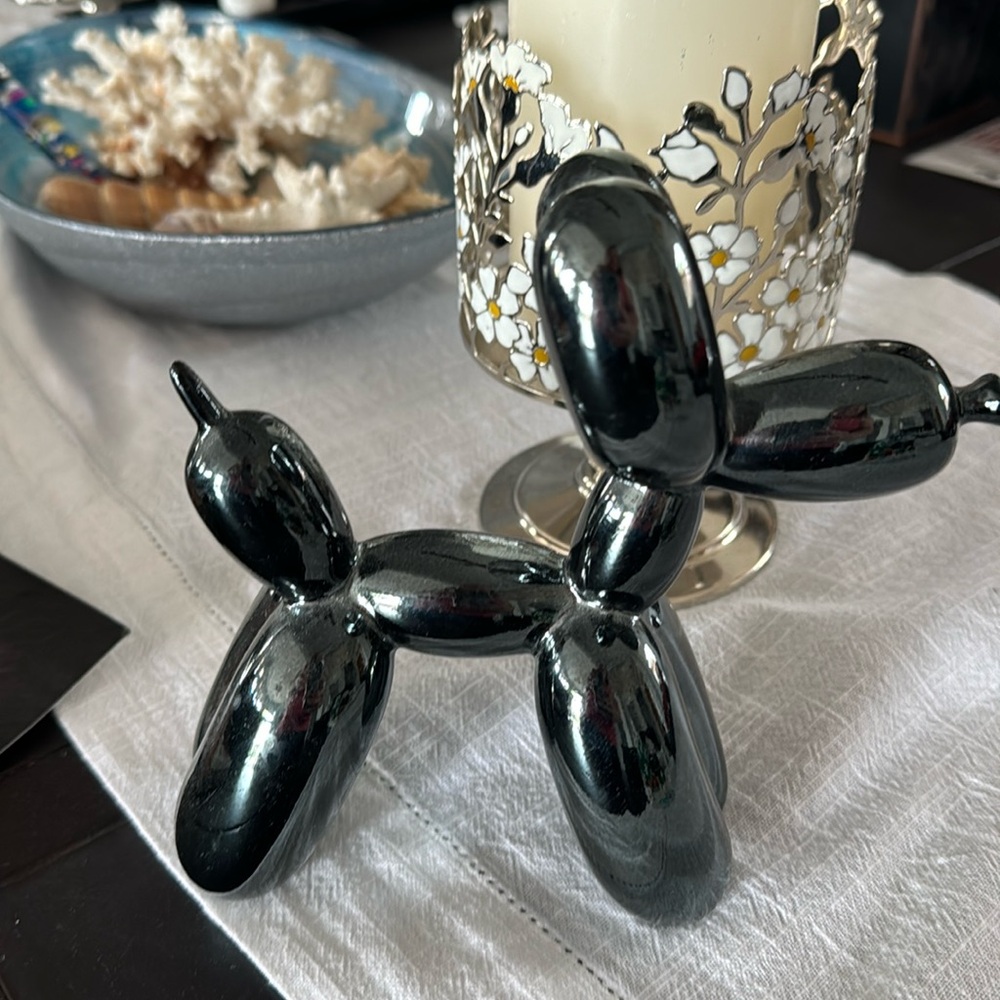 Cute metallic balloon animal dog that could be used as a paper weight / bookend